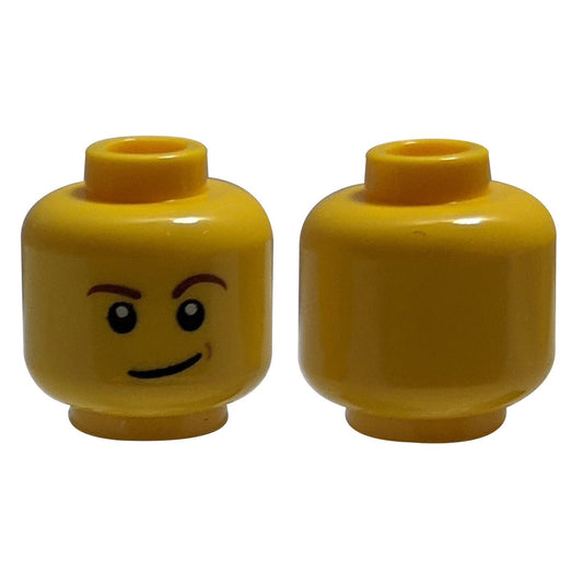 LEGO® minifigure head with reddish-brown eyebrows, white pupils, a lopsided smile, and a medium nougat dimple.