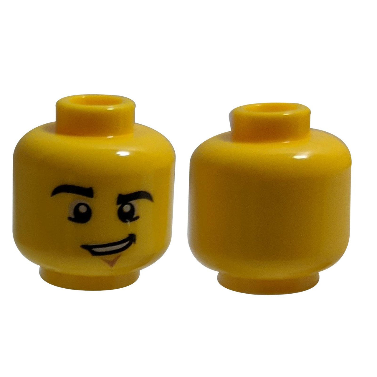 Minifigure, Head Male Black Eyebrows, Chin Dimple and Lopsided Grin Pattern - Hollow Stud